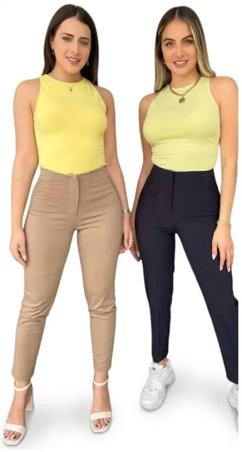 Pantalones casuales de vestir en colores beige y azul marino de talle alto con corte ajustado y costuras decorativas.