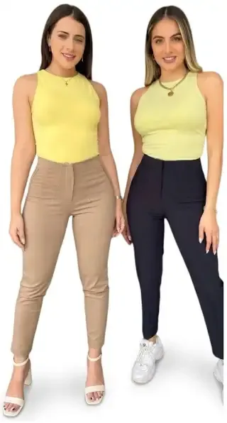 Pantalones casuales de vestir en colores beige y azul marino de talle alto con corte ajustado y costuras decorativas.